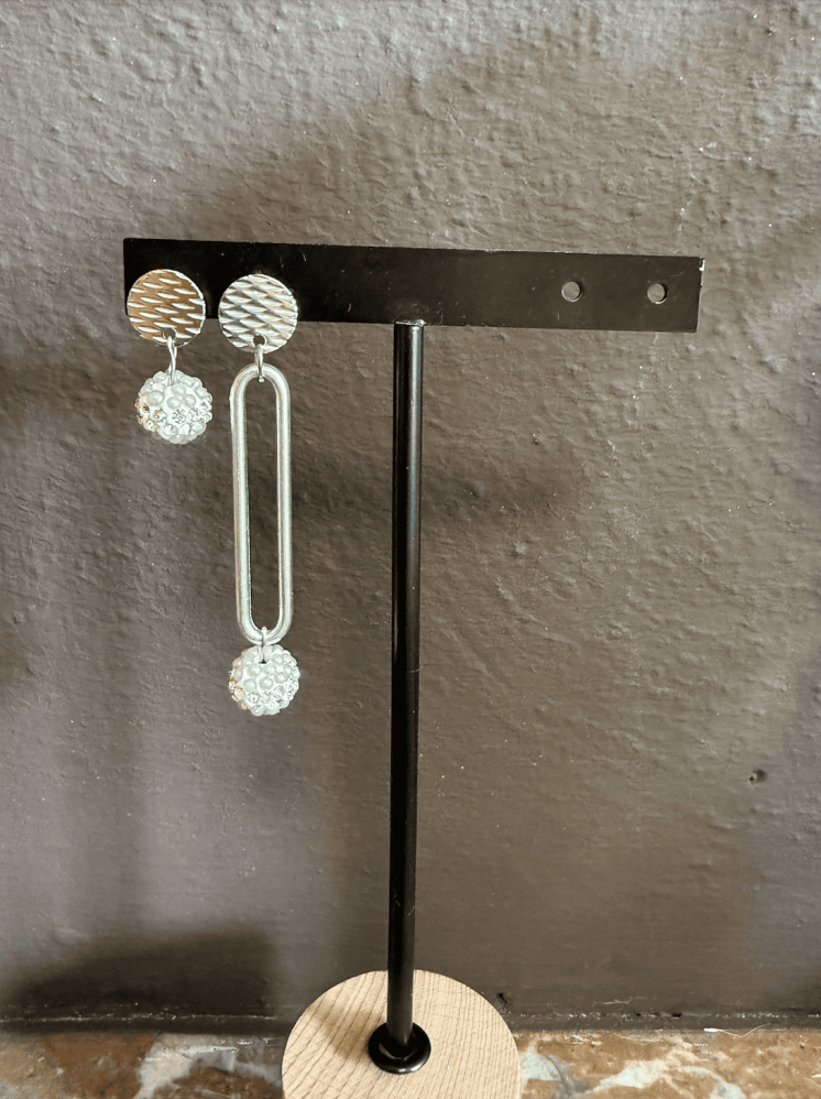 Boucles « Ginni » asymétriques en acier argenté